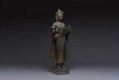 A large bronze Lopburi-style standing Buddha Shakyamuni, Thailand or Cambodia, 20th C.