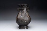 A large Chinese archaistic arrow vase with Taotie design, 'Touhu 投壺', Yuan/Ming