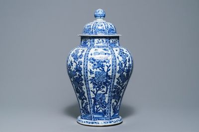 A large Chinese blue and white baluster jar and cover with floral panels, Kangxi