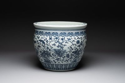 A large Chinese blue and white fish bowl with birds, deer, insects and flowering branches, 19th C.