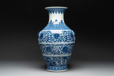 A large Chinese blue and white 'flower scroll' vase, Qianlong mark, 19th C.