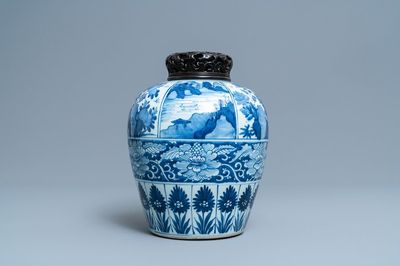 A large Chinese blue and white jar with wooden cover, Kangxi