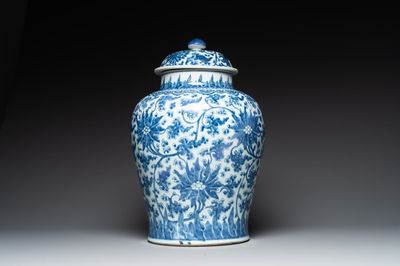 A large Chinese blue and white 'lotus scroll' vase and cover, Kangxi