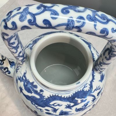 A large Chinese blue and white 'Nine Dragons' wine pot — photo 12