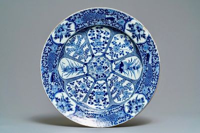A large Chinese blue and white 'peacock border' dish, Kangxi