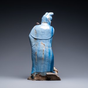 A large Chinese blue-glazed Shiwan pottery 'immortal' figure, 19th C. — photo 4