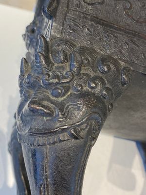 A large Chinese bronze censer and cover with a dragon in a rocky landscape with various animals, Yuan — photo 33