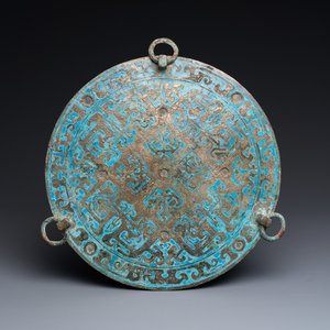 A large Chinese bronze mirror with turquoise and gold or gilt silver inlays, Warring States Period — 照片 1