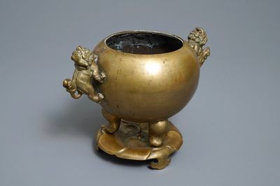 A large Chinese bronze tripod censer on stand, 19th C.
