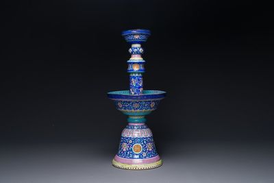 A large Chinese Canton enamel blue-ground 'shou' candlestick, Qianlong/Jiaqing