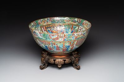 A large Chinese Canton famille rose bowl with a bronze stand, 19th C.