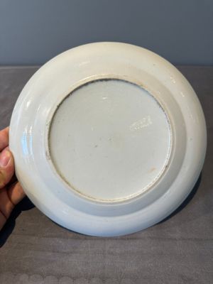 A large Chinese Canton famille rose dish and eight plates, 19th C. — photo 19