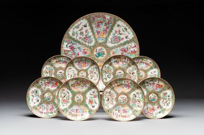 A large Chinese Canton famille rose dish and eight plates, 19th C.