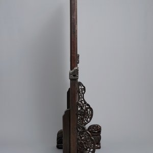 A large Chinese carved zitan wood panel with jade and turquoise, set in a hongmu wood frame and stand, Qianlong — photo 10