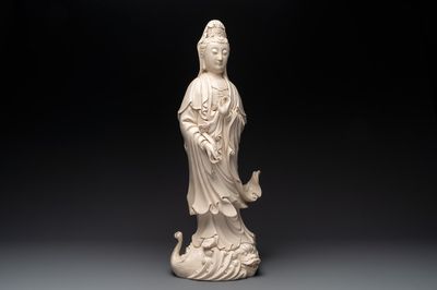 A large Chinese Dehua blanc de Chine Guanyin with a ruyi, 20th C.