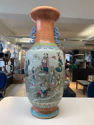 A large Chinese famille rose coral-red-ground  'Eight Immortals' vase, Qianlong mark, 19th C. — photo 1