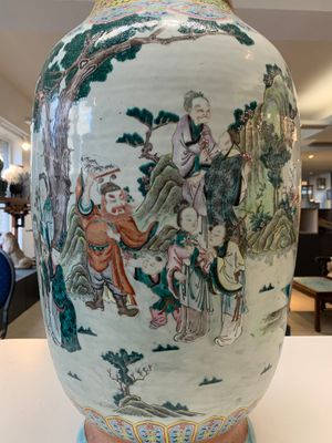 A large Chinese famille rose coral-red-ground  'Eight Immortals' vase, Qianlong mark, 19th C. — photo 11
