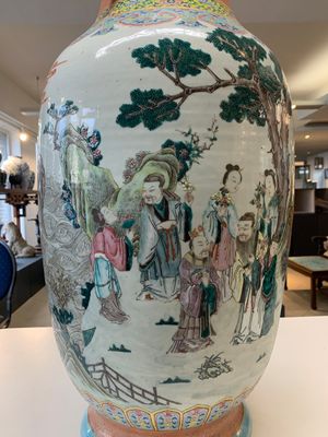 A large Chinese famille rose coral-red-ground  'Eight Immortals' vase, Qianlong mark, 19th C. — photo 17