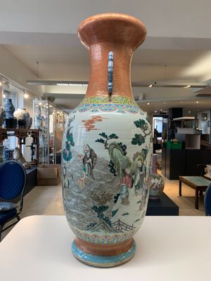 A large Chinese famille rose coral-red-ground  'Eight Immortals' vase, Qianlong mark, 19th C. — photo 2