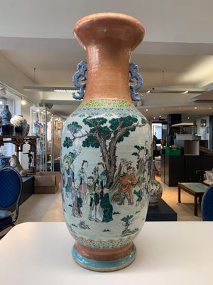 A large Chinese famille rose coral-red-ground  'Eight Immortals' vase, Qianlong mark, 19th C. — photo 3