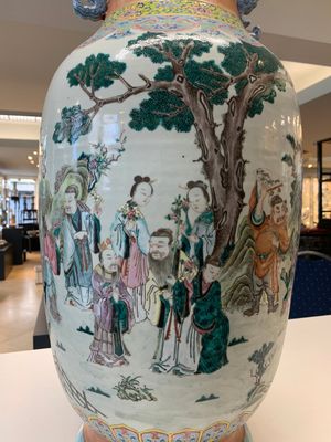 A large Chinese famille rose coral-red-ground  'Eight Immortals' vase, Qianlong mark, 19th C. — photo 10