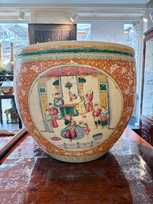 A large Chinese famille rose coral-red-ground fish bowl with narrative design, 19th C. — photo 1