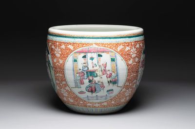 A large Chinese famille rose coral-red-ground fish bowl with narrative design, 19th C.