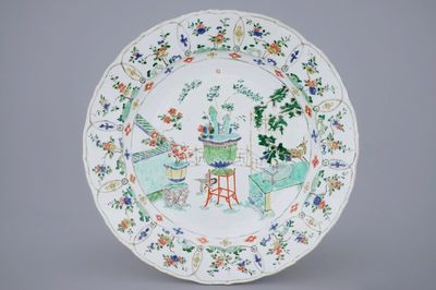 A large Chinese famille verte dish with a botanical garden, Kangxi