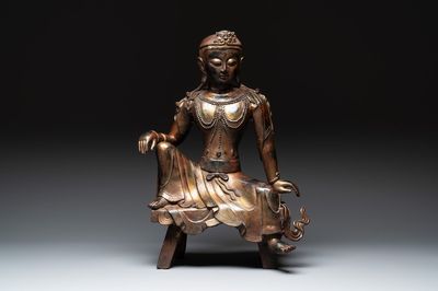 A large Chinese gilt bronze seated Bodhisattva, 20th C.