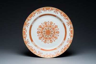 A large Chinese iron-red and gilt dish with ornamental design, Qianlong