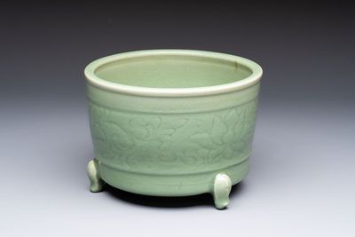 A large Chinese Longquan celadon tripod censer with floral design, Ming