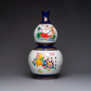 A large Chinese polychrome-decorated blue-ground double-gourd vase, 20th C. — photo 1