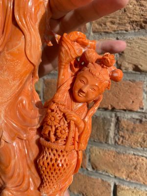 A large Chinese red coral group of a lady holding a cornucopia surrounded by children, 19/20th C. — photo 24