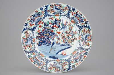 A large clobbered Chinese blue and white dish, Kangxi