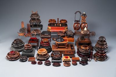 A large collection of 76 varied Chinese wooden stands and covers and 2 boxes, 19/20th C.