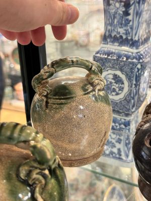 A large collection of nineteen Vietnamese stoneware lime pots, 14th C. and later — 照片 31