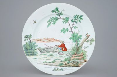 A large Dutch-decorated Chinese dish with a fisherman, 18th C.
