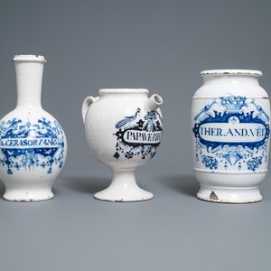A large Dutch Delft blue and white albarello, a wet drug jar and a Brussels faience bottle, 18th C. — photo 1