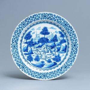 A large Dutch Delft blue and white 'deer hunt' charger, 1st quarter 18th C. — photo 1