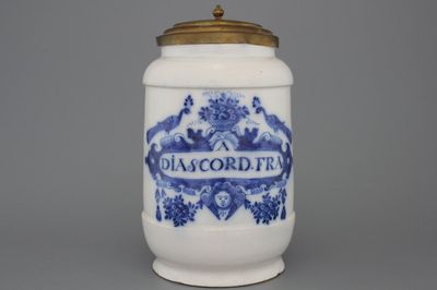 A large Dutch Delft blue and white pharmacy jar and cover, albarello form, 18th C.