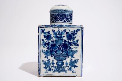 A large Dutch Delft blue and white tea caddy with original cover, ca. 1700