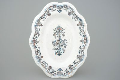 A large French faience oval dish with floral design, Rouen, 18th C.