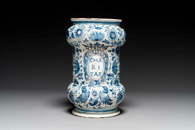 A large Italian blue, white and manganese albarello drug jar inscribed Charitas, probably Savona, dated 1767