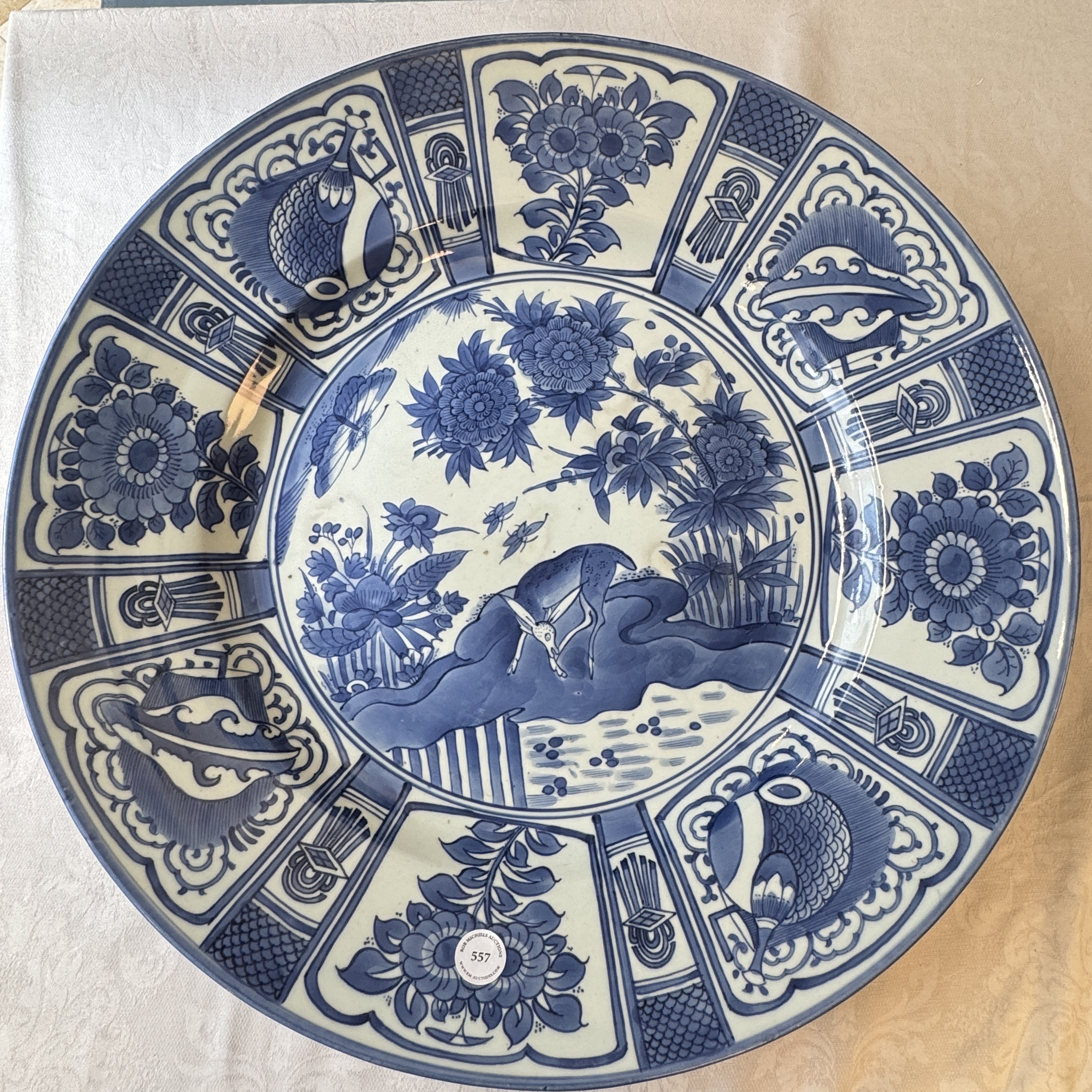 A large Japanese Arita blue and white 'Deer' charger in Kraak-style — photo 1