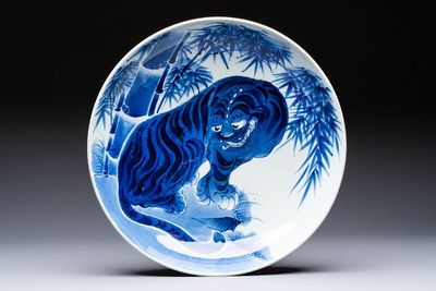 A large Japanese Arita blue and white 'Tiger' dish, Fuuki Chousun 富貴長春 mark, late Edo to early Meiji, 18/19th C.