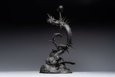 A large Japanese bronze dragon holding a pearl, Meiji, 19th C.