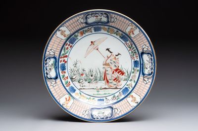 A large Japanese Imari 'Parasol Ladies' dish after Cornelis Pronk, Edo, 18th C.