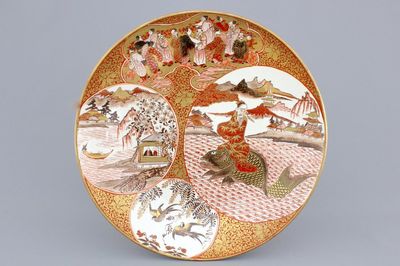 A large Japanese Satsuma porcelain dish with carps, 19th C.