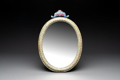A large oval Chinese Canton enamel mirror, Qianlong