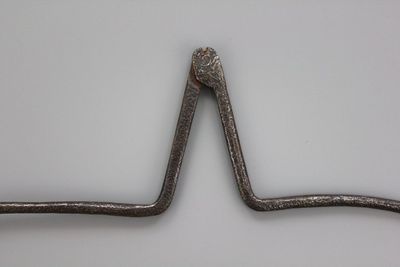 A large pair of rounded outside iron calipers, 17/18th C.